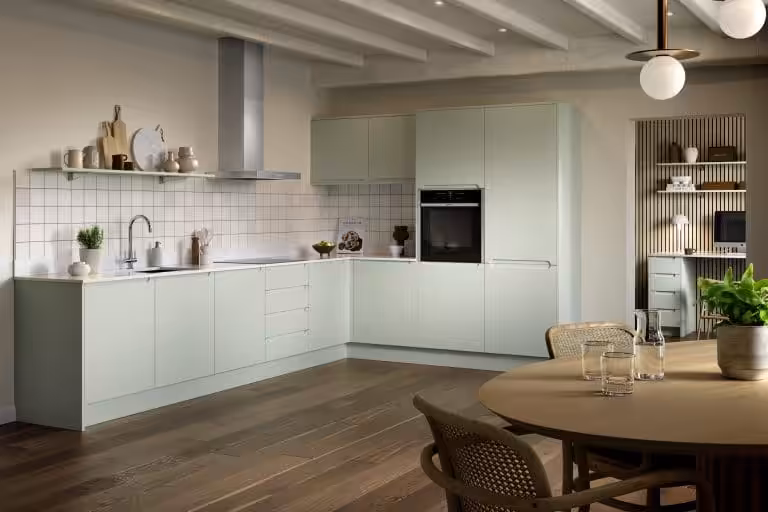 Chelsea handleless one-piece kitchen in Matt Pistachio with built-in J groove