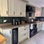 Transforming a Home with a Green Shaker Kitchen: Open-Concept Benefits and Style