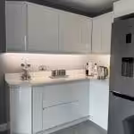 Transforming a Childhood Home: A Kitchen Revamp Full of Meaning-Featuring Gloss White Kitchen Cabinets
