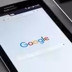 Recent Projects | Make Your Kitchen the Heart of Your Home With A Tefore Custom Kitchen Close-up of a tablet displaying Google's search screen, emphasizing technology and internet browsing.